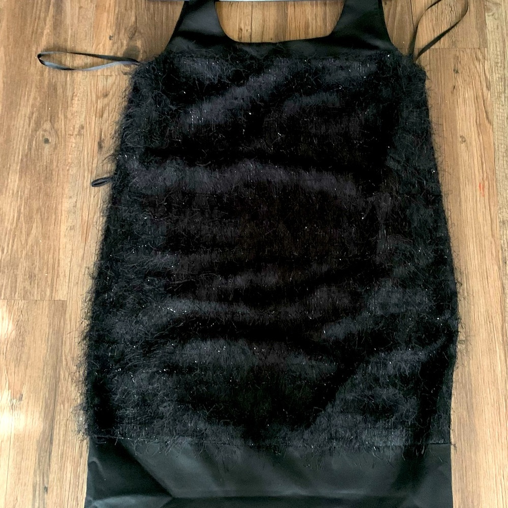 Rachel Roy sleeveless holiday style dress.